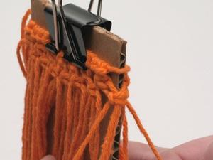 Take 2 cords from one knot and 2 from one beside it, and tie a new square knot between them using the 4 cords.