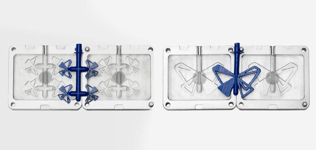 Fig 4. 3D printed molds in aluminum frames and injection molded parts. One mold was a large Formlabs butterfly logo and the second was four small Formlabs butterfly logos.