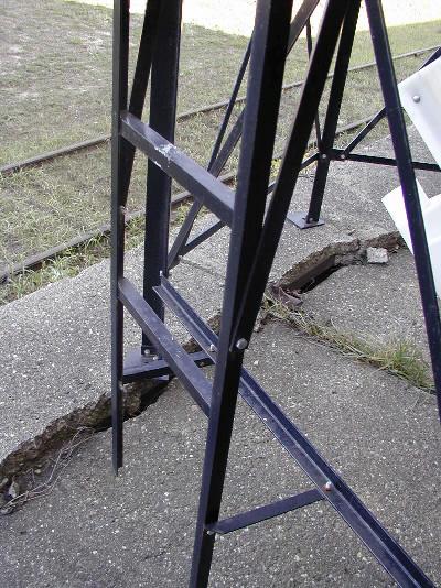 Step 4: Now mount the bottom section of the ladder to the stand in the section you want. The bottom section of the ladder will mount to the upper & lower leg spacer angles.