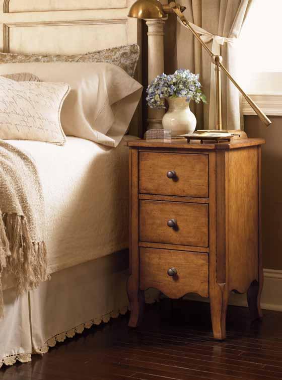 Nailhead trim applied over a tone-on-tone linen tape is a signature element of