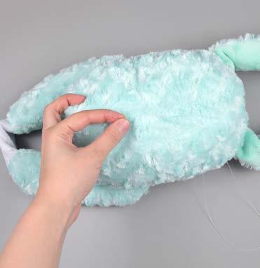 Once the plush is stuffed, make sure the seam allowances in the opening are tucked inside and prepare to ladder stitch it