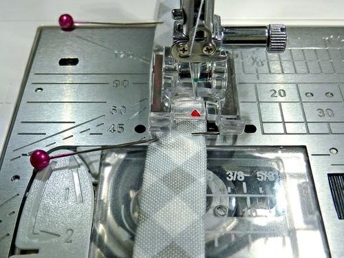 Thread the machine with thread to best match the binding fabric in the
