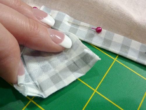 9. Re-fold and re-wrap the tail of the binding around