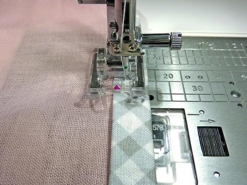 gray. Set up the machine for a wide zig zag stitch. 13. Zig zag around the entire perimeter of the towel.
