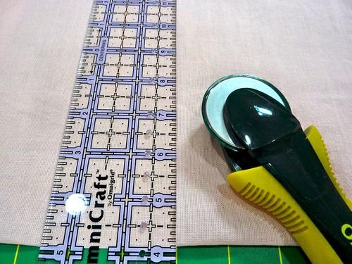 2. We chose a rotary cutter and ruler, using the guide lines on our cutting mat for a nice straight slice. 3.