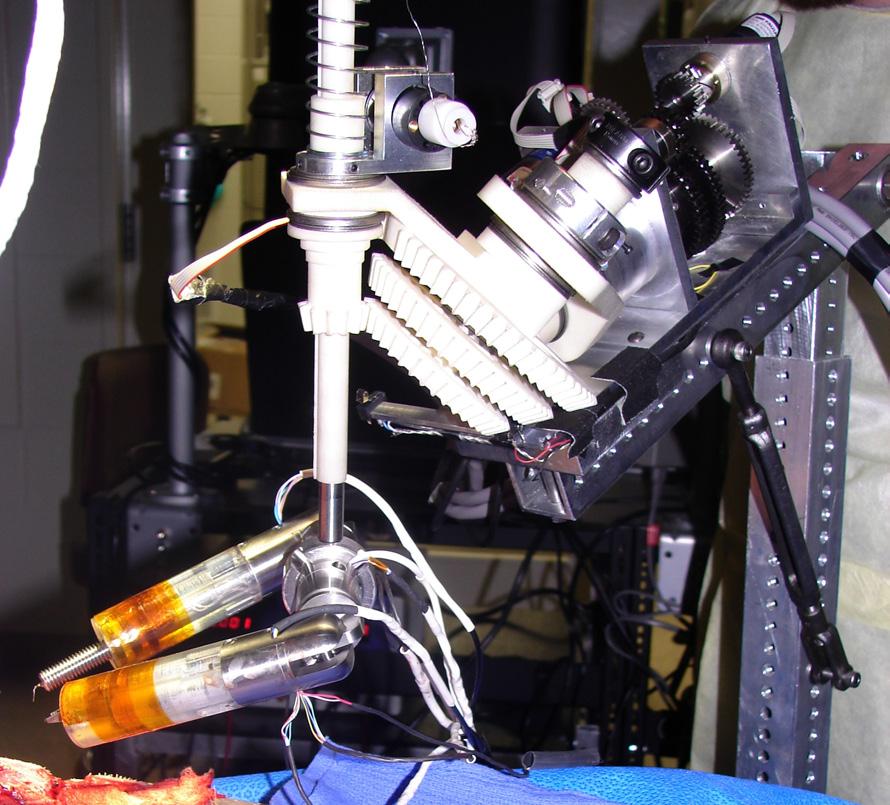 in a porcine model. The CoBRASurge and Dexterous Robot were used as a macro-micro cooperative robot system.