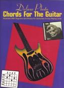 This great chord book includes photos of the guitarists hand on the fret board in each of the 1050