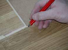 With a pencil, mark where to cut 8-10 mm from the end of the previous board, to