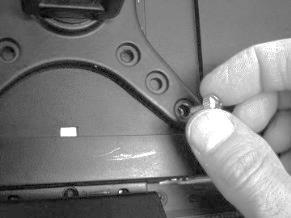 Align the monitor bracket over the four screw holes. TIP: The topside has a smaller opening hole than the bottom. 4.