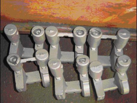 Simple castings with feeders attached Complex engine casting with feeders removed Natural feeders Feeders moulded in the same material that forms the mould for the casting, usually sand, are known as