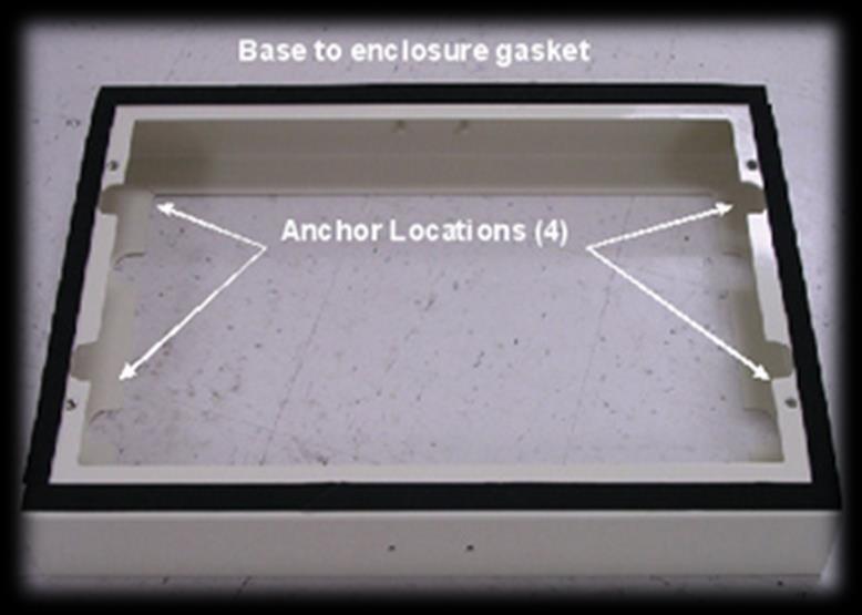 If the base is installed on the enclosure, remove the base by removing the (4) bolts from the bottom of the inside of the cabinet. Position the enclosure base onto the pad (typically concrete).