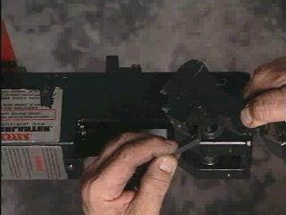 The corner of the shaft should hold the cocking cam plunger down while inserting the shaft (W10015).