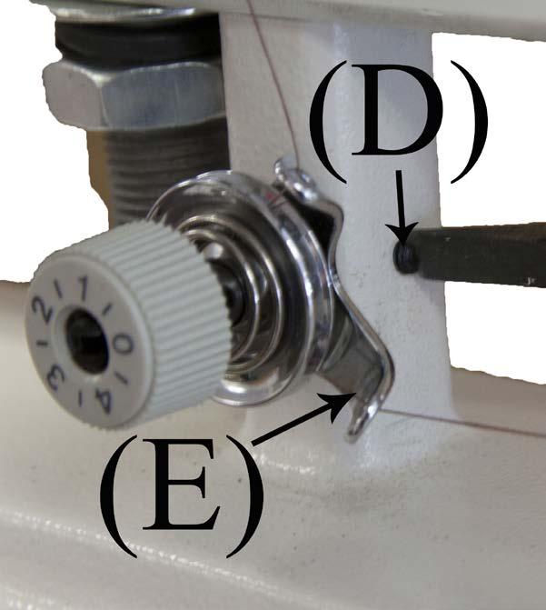 winder lever (B) from moving Figure 101 Adjusting the tension assembly thread guides for proper fill.