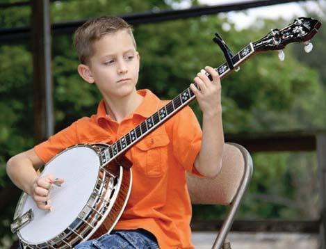 news page Jonny Mizzone The Sleepy Man Banjo Boys often practiced their music at home in their bedrooms. Jonny started playing the banjo when he was just six years old.