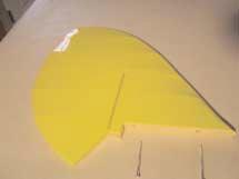 FUSELAGE ASSEMBLY (CONTINUED) Locate the vertical stabilizer