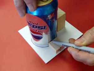 line all around the can with a felt pen.