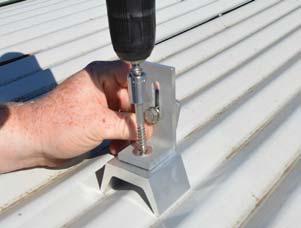 4) Attach the Corrugated Block with L-foot using a 5/16 lag bolt (TYP) or appropriate lag with a minimum embedment of 2 ½