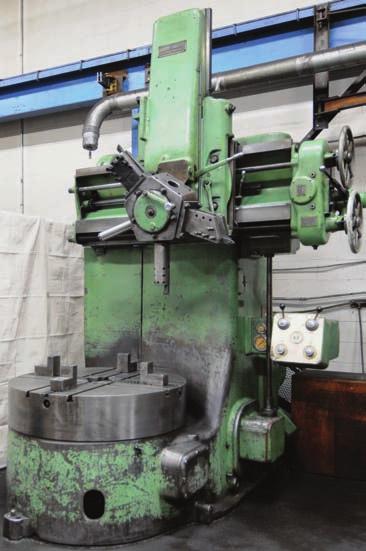 machine Partial view of vertical milling machines LARGE STEEL INVENTORY & WORK IN PROCESS