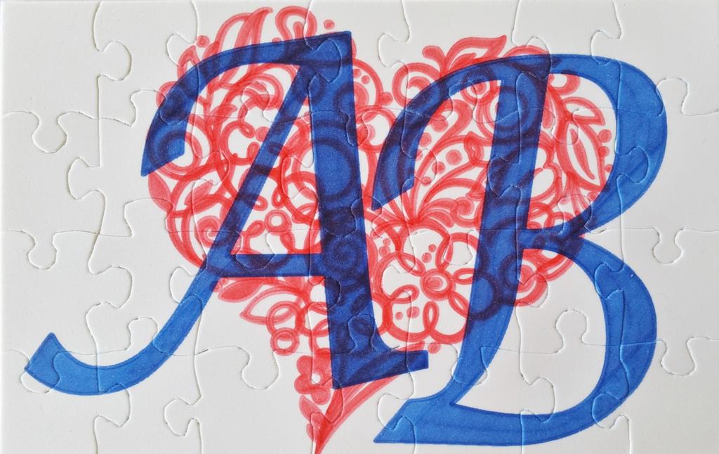 Love is a Puzzle Created by Sylvain Bergeron This monogram features PaintWork and CutWork.