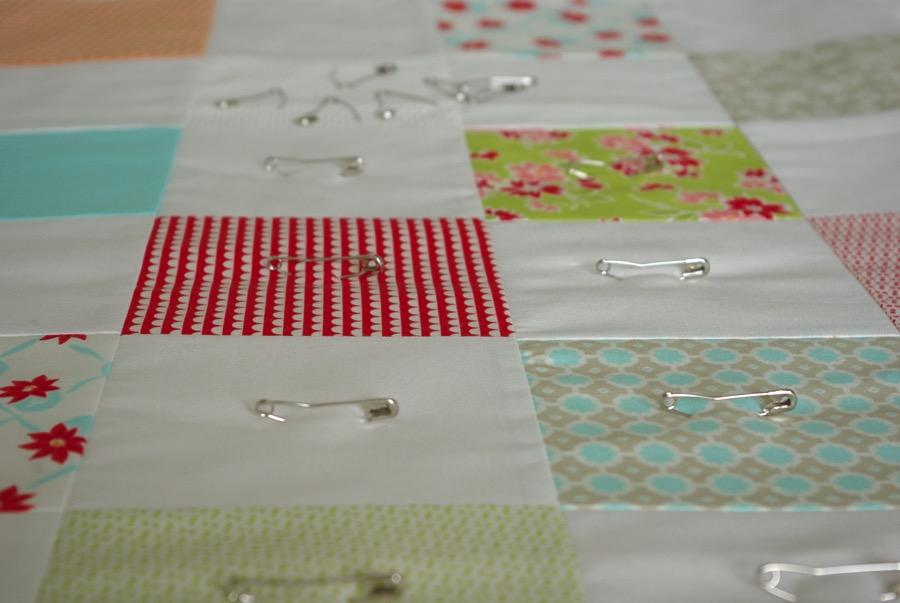 7 SANDWICHING YOUR QUILT: Sandwiching is assembling your quilt top, batting and backing.