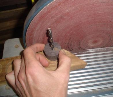 27) The hole saw I had was a little too large so I used this technique to make the part smaller.