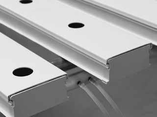 Holes can be drilled with the lids in place; try not to allow debris to drop into the channels. 6.