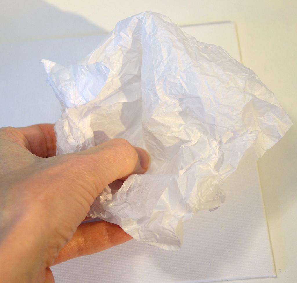 Bunch up the tissue paper in your fist to make lots of wrinkles (Figure 3). 3. Slightly flatten the wrinkles in the tissue (peek ahead to Figures 5 and 6).