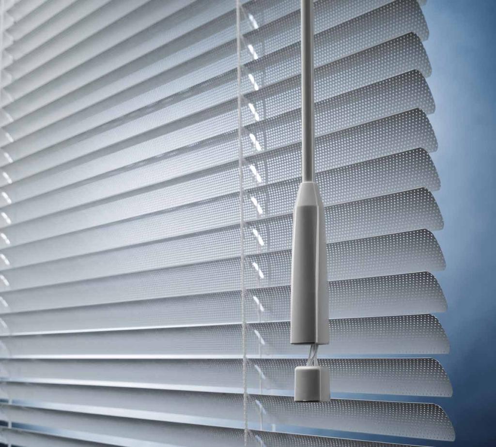Small Venetian Silent Gliss 8100 and controlled Venetian blind ideally suited for window frame fitting due to the narrow head rail (mm slats only).