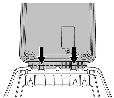 Figure 4.10: Press the release catch and lift the battery pack away Figure 4.