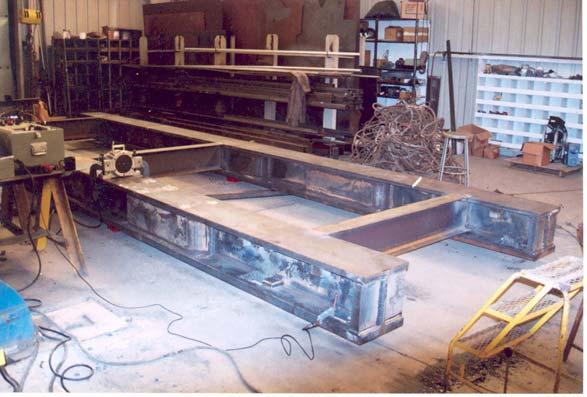 XYY Plotter (gray cabinets), are visible just to the right of the Vibrator.