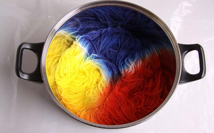Press down yarn to soak up the dye, ensure