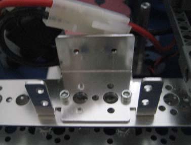 a. Use two screw-kep nut combinations to attach the single-servo bracket to the