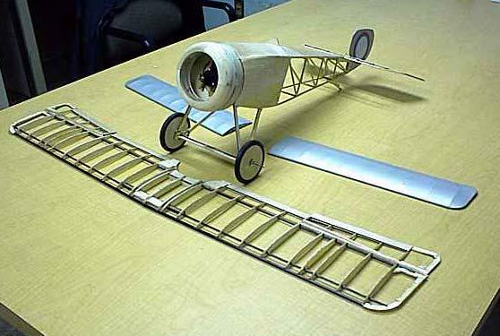 designed torque rod to cause the aileron cranks to move in unison with the ailerons operated by the in wing servos.