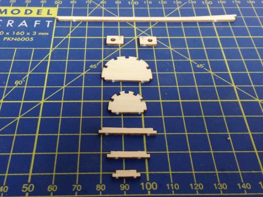 Pin the parts down to keep them flat and ensure that any glue that squishes out from the parts is removed