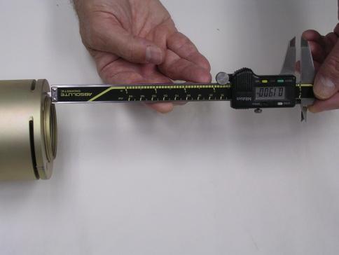 Picture 6C Use of Stick Out Gage on the Gas Turbine side of the Flange Joint Picture 6D Use of Drop Gage to measure stick out Picture 6E Use of Calipers