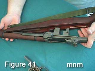 Insert receiver and barrel assembly into stock as shown in Figure 41.