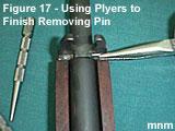 Use the medium punch to tap pin out of lower band,