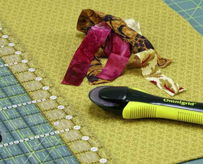 1 Supplies Fabric or fabric scraps, cotton thread (I prefer Aurifil 2370 for color; it blends beautifully with any fabric), acrylic ruler, rotary