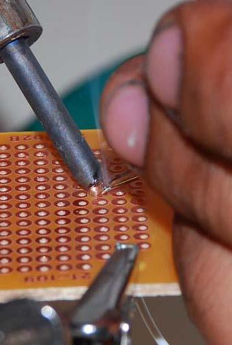 When solder flows, apply no more than ½ inch length of solder.