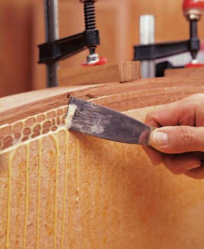 You want a solid, cured glue-up to guard against any movement along the joints. F G Place a block under each clamp to spread the force.
