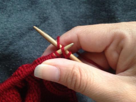Make 1 Right: Lift the bar between the stitches on the right and left needle, by