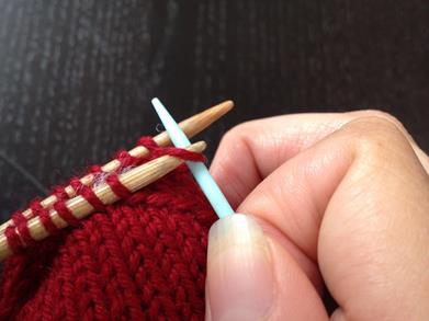 purl, and pull the yarn through.