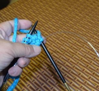 3 Put the right tip back into the stitch, this time into the back loop.