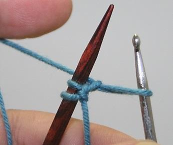 On the knitting needle, you can see one stitch loop.
