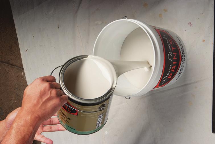 WALLS Use a brush to paint a 2-inch-wide strip along the ceiling and