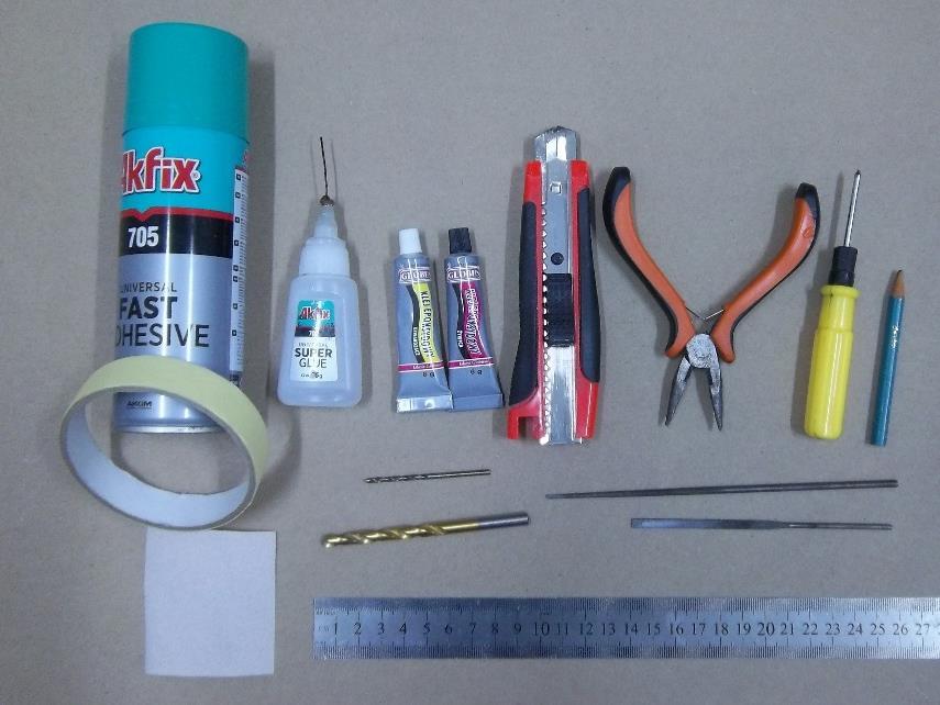 Materials and tools for the installation of the model: 1) Liquid superglue (Akfix 702); 2) Superglue activator; 3) Epoxy; 4) Masking tape; 5) Sandpaper 240-320;