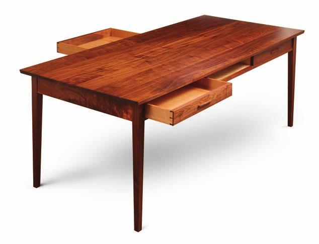 long A sleek, sturdy design for a versatile table B Y S T E P H E N H A M M E R Many of my favorite designs began with a challenging request from a client, and that was definitely the case with this