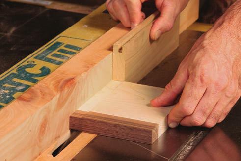 The upper stretchers connect to the legs with lap dovetails. The socket for the dovetail is cut later.