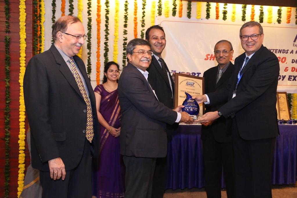 SBI receives Best Bank Award for Electronic Payment Systems among Large Banks (L to R) A S Ramasastri (Director, IDRBT), Sudarshan Sen (ED, RBI), Amit Saxena (Dy. CTO (e-channels), SBI), S.