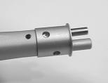 Using moderate force, seat the aluminum spindle block flush with the air connector assembly.